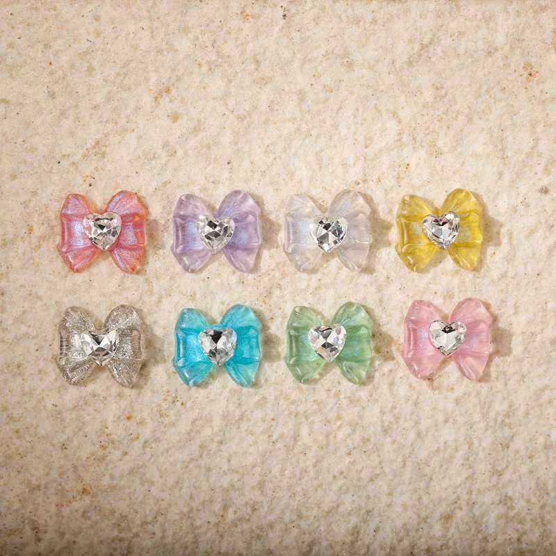 10 pz/lotto Ice Clear Nail Art Bow Charms Con Cuore Strass Gemma di Cristallo Trasparente Glitter Bowknot Unghie Decorazione Accessorio