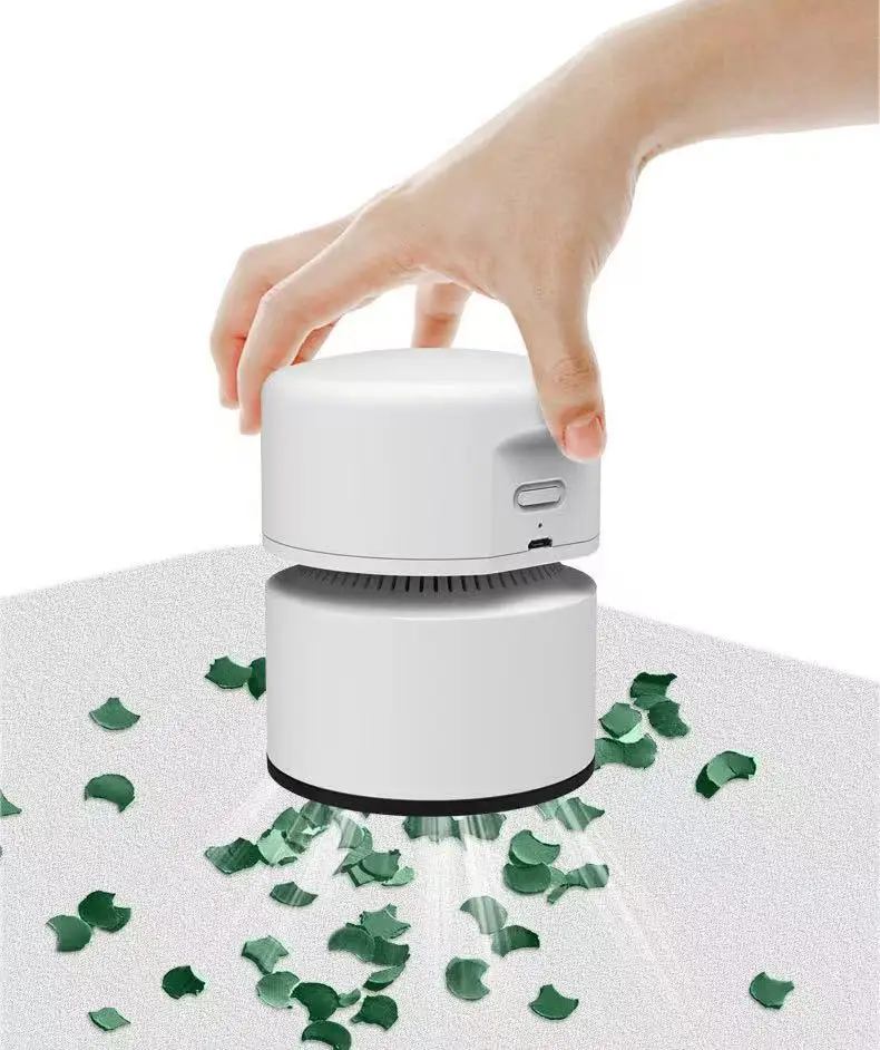 新しい小型 USB オフィスおよび家庭用ポータブル ミニ ワイヤレス ハンドヘルド クリーナー デスクトップ掃除機