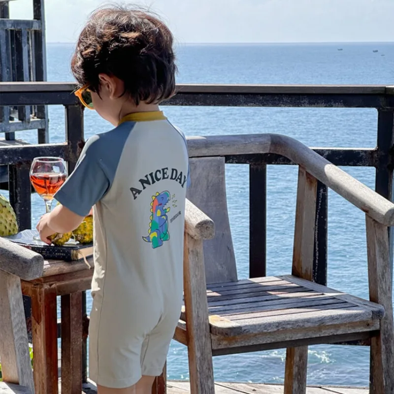 Bañador de una pieza para niños, traje de baño de manga corta con cremallera a prueba de sol, traje de surf de dinosaurio de dibujos animados, traje de baño para niños pequeños