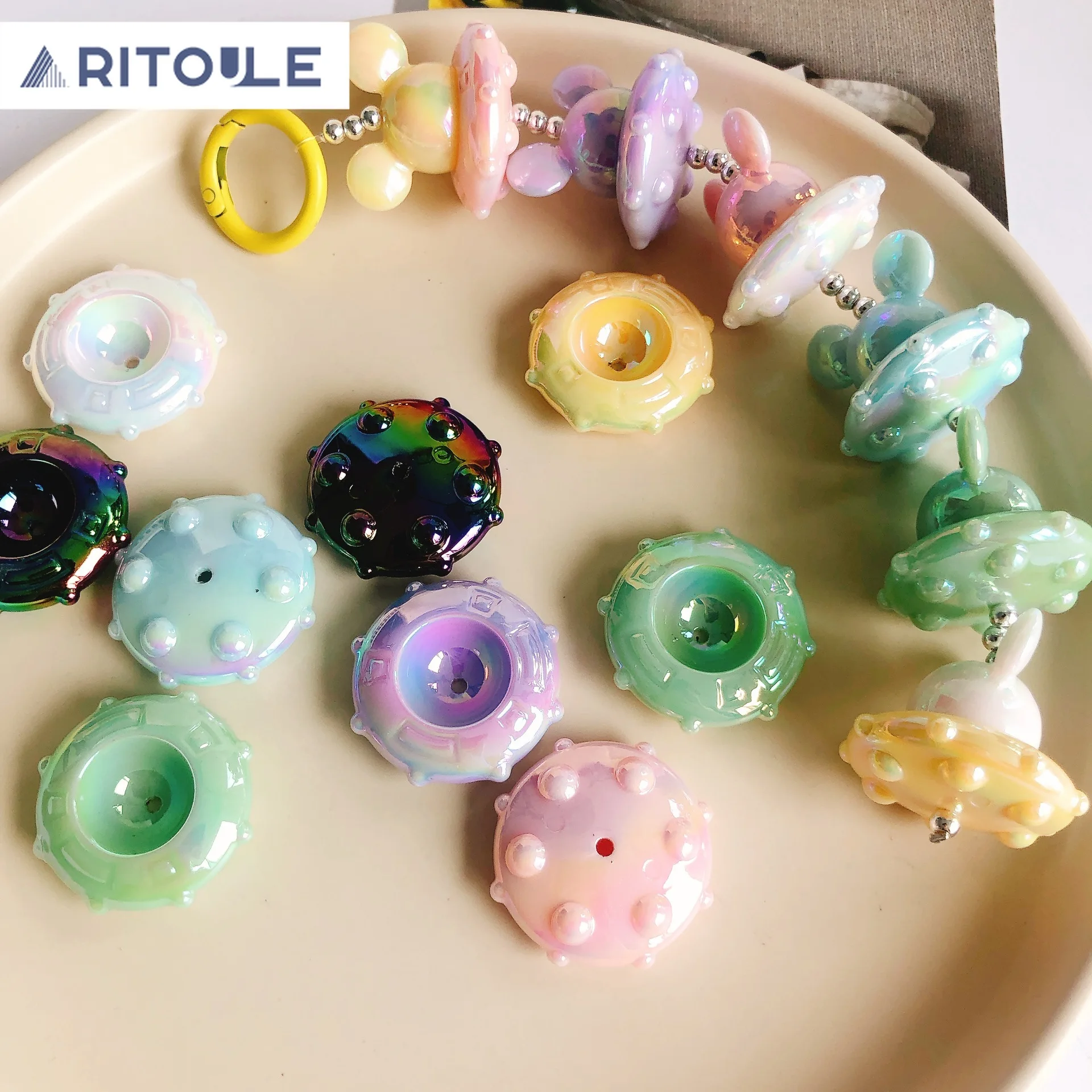 

Candy colored handmade acrylic cute spaceship beads mobile phone pendants DIY accessories wholesale keychain