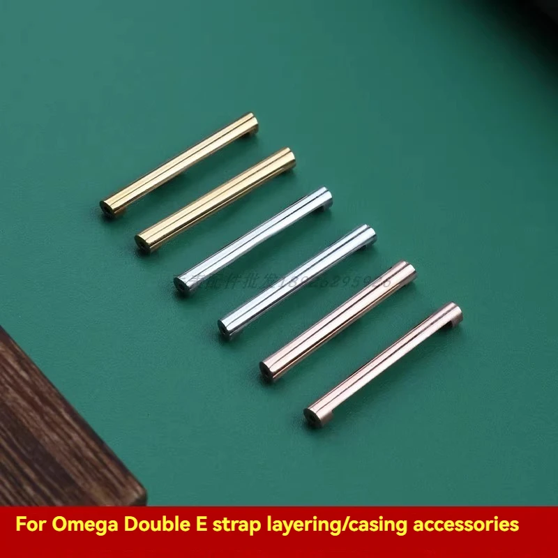 لكوكبة أوميغا، واجهة حزام النسر المزدوج، قسم الساعة، شريط الضغط، شريط ذهبي، شريط فولاذي، أكمام قسم الساعة