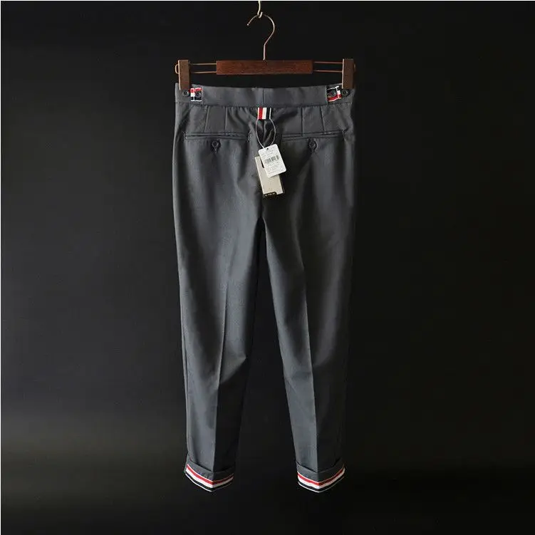 Pantalones recortados resistentes a las arrugas de estilo coreano para hombre, pantalones de traje ajustados sin planchado, pantalones largos informales de pierna pequeña, Verano