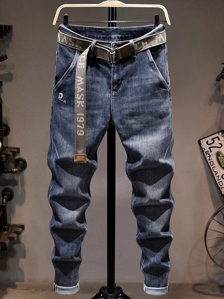 

Мужские джинсы Slim Fit на весну-осень, эластичные повседневные брюки в корейском стиле, износостойкие, джинсовая ткань, синие, длина 7/8, средняя посадка, на молнии