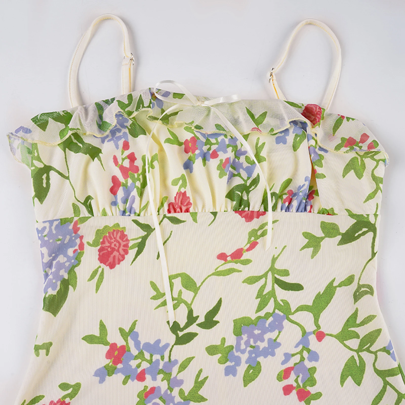 ชุดเดรสฤดูร้อนของผู้หญิงมิดิ คามิแขนกุดเปิดหลังพิมพ์ลายดอกไม้ชุดสายสปาเก็ตตี้