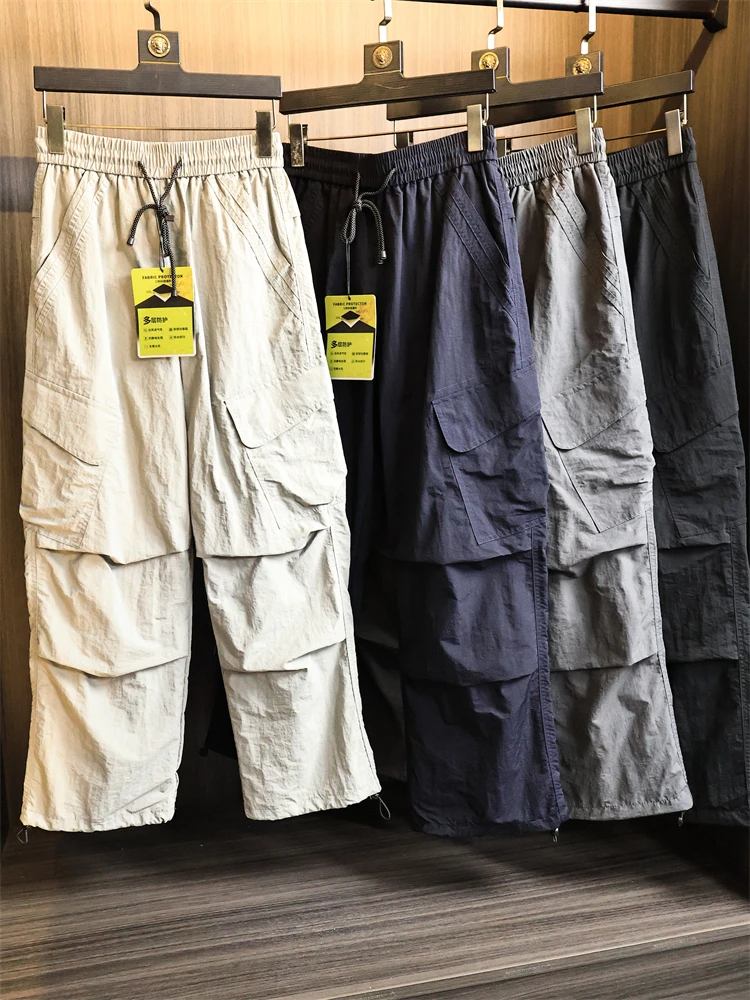 

Водонепроницаемые спортивные повседневные брюки на открытом воздухе, мужские осенние модные брюки из нейлоновой ткани с прямыми штанинами для молодых мужчин