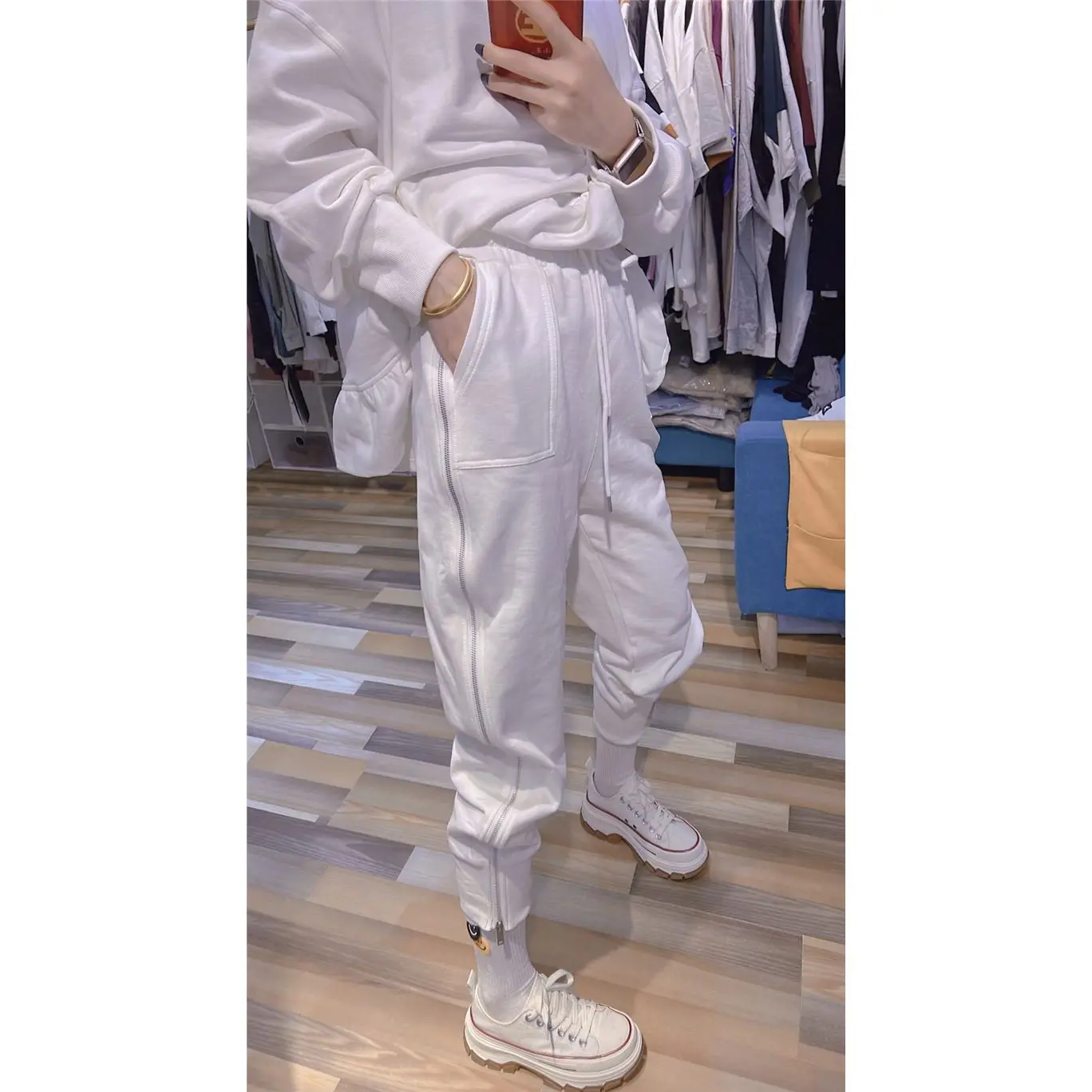2025 ฤดูใบไม้ผลิและฤดูร้อนใหม่ซิปด้านข้างกางเกงขายาวขนาดเล็กผู้หญิงเกาหลีรุ่นสบายๆกางเกงสีขาวหลวมHoodieกางเกงน้ําหญิง