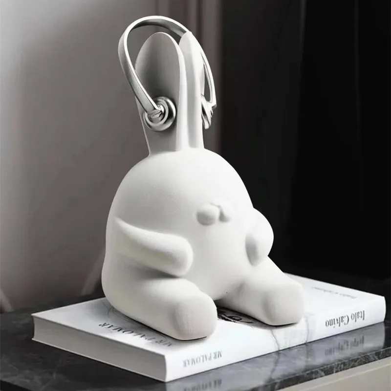 

Simple modern creative abstract earphone rabbit ornament, living room study entrance desktop art decoration
