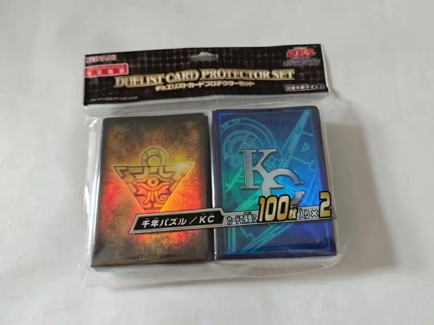 200Pcs Yugioh KONAMI Duel Monsters Millennium Puzzle KC Set Official Collection Sealed Duelist Card Protector Sleeves