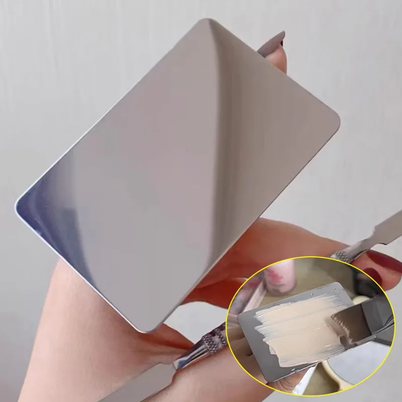 

Stainless Steel Makeup Mixing Palette With Ring Spatula Portable Cosmetic Nail Art Mixing Tray Tool Professional Makeup Palette
