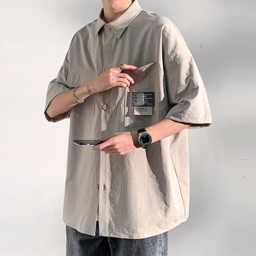 Summer Men\'s 5XL Oversized Short Sleeve Shirts Japanese Casual Lapel Blouses Tops High Street Multi-pocket Shirt Men Camisas