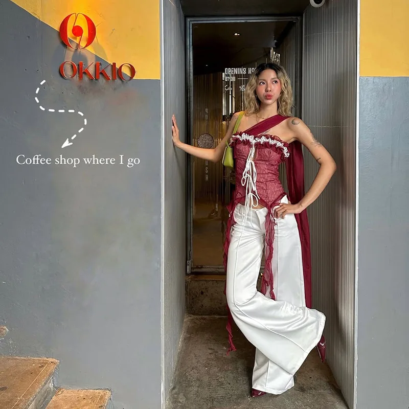 

Весна 2025 г., трансграничный женский жилет с запахом на груди, облегающий жилет с волнистыми волнами и волнистыми плечами, модный вязаный топ