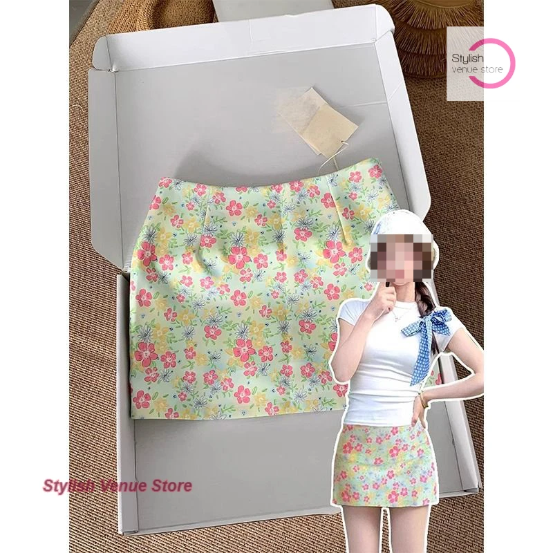 

French oil painting A-word floral skirt female summer new fashion blue skirt dopamine seaside wear a beautiful bag hip overskirt