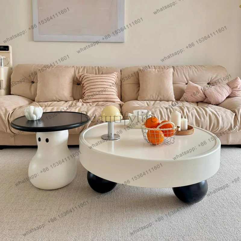 

Cream wind round coffee table modern simple creative living room small apartment household coffee table