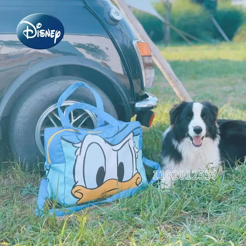 Nuevo bolso de viaje Disney Donald Duck para mujer, bolso de viaje portátil de dibujos animados, bolsa de almacenamiento impermeable de gran capacidad, alta calidad