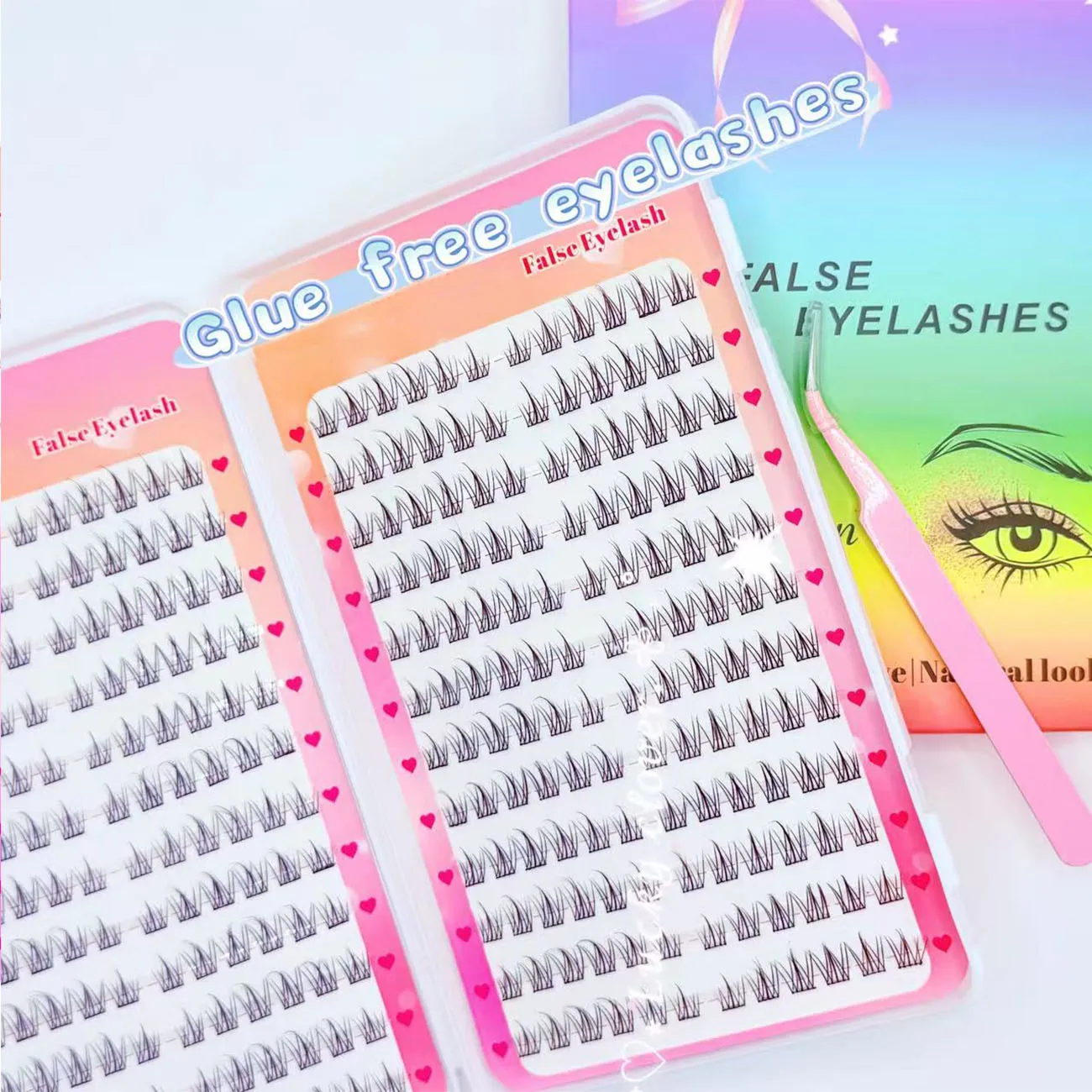 Samoprzylepne kępki rzęs w kręconych segmentach, bez kleju, z pęsetą (24 rzędy, 288 kępek) do tutoriali makijażu.