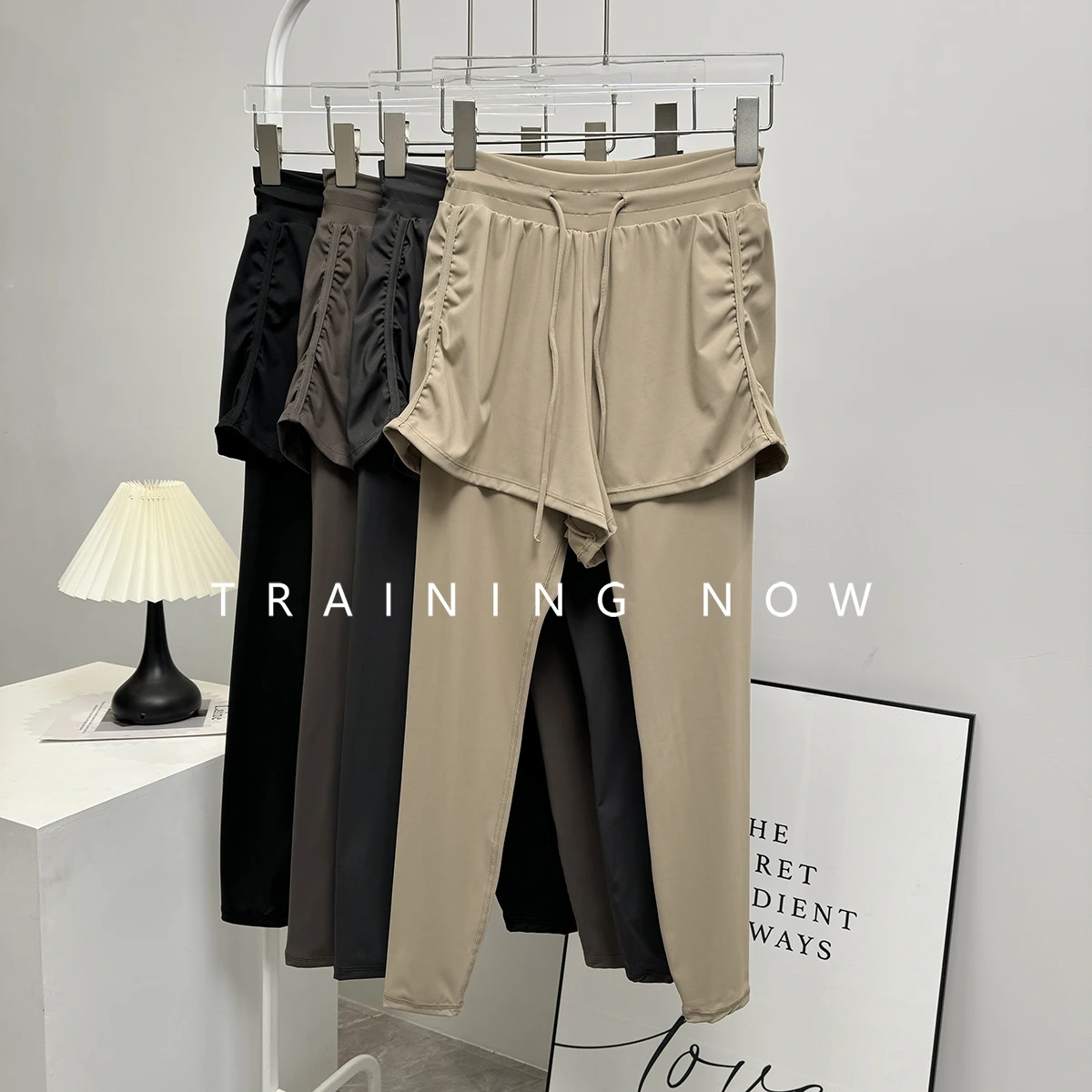 

Fake two-piece hip-covering sports trousers for women in spring and autumn high-waisted belly-closing yoga pants to make them