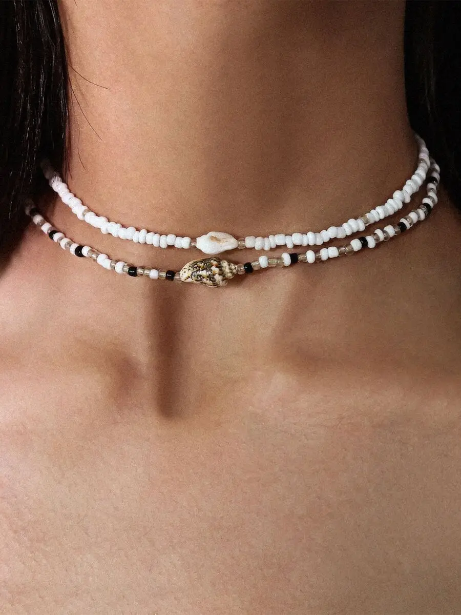 

2pcs Bohemian beach necklace set with mixed-color rice beads and natural seashells