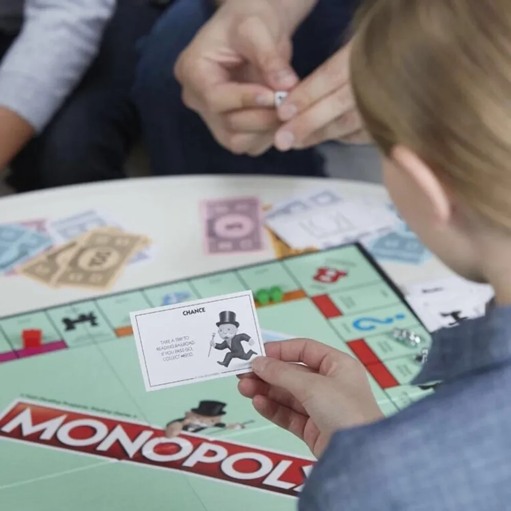 Experience Fun for All Ages with MONOPOLY English Board Game - Classic Game for Family and Friends