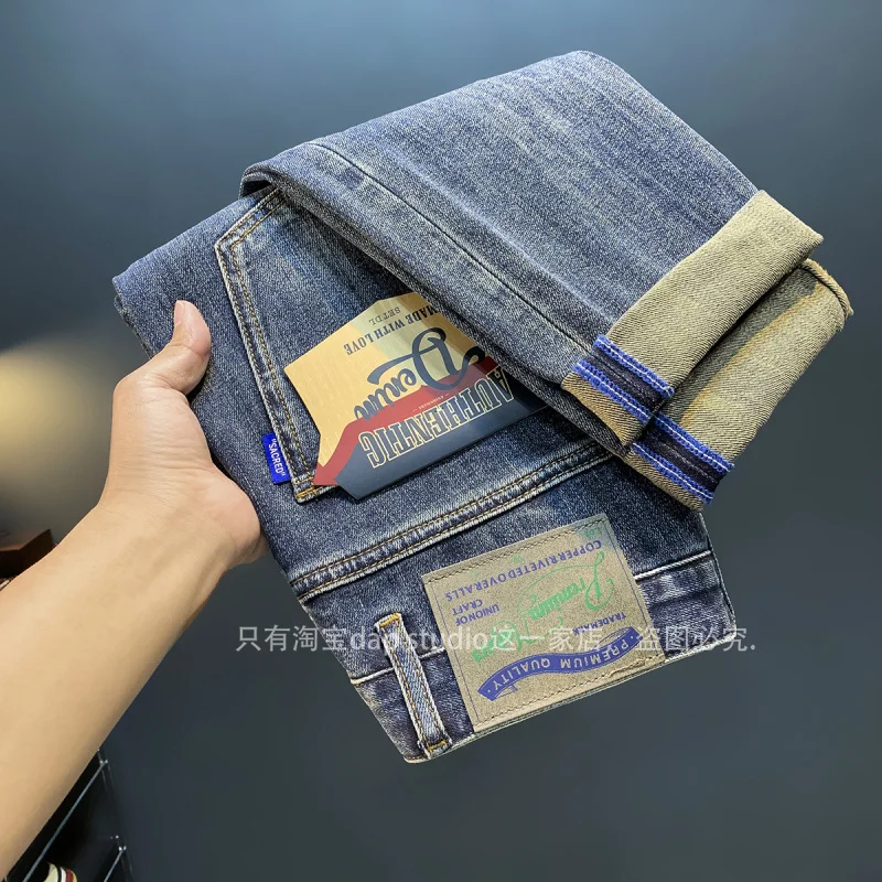 Celana panjang regang kasual ramping pria, jeans mewah kelas atas musim gugur n2024baru bordir tren slim fit