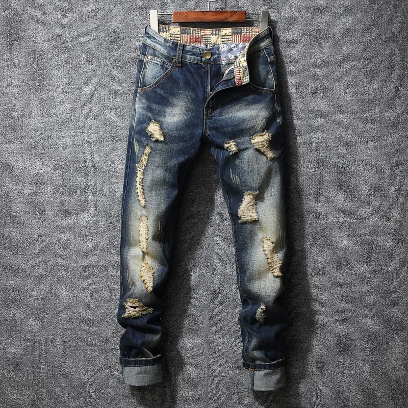 Jeans in Denim da uomo strappati di personalità nuovi pantaloni di marca Hip-Hop con foro rotto europeo e americano di grandi dimensioni maschili