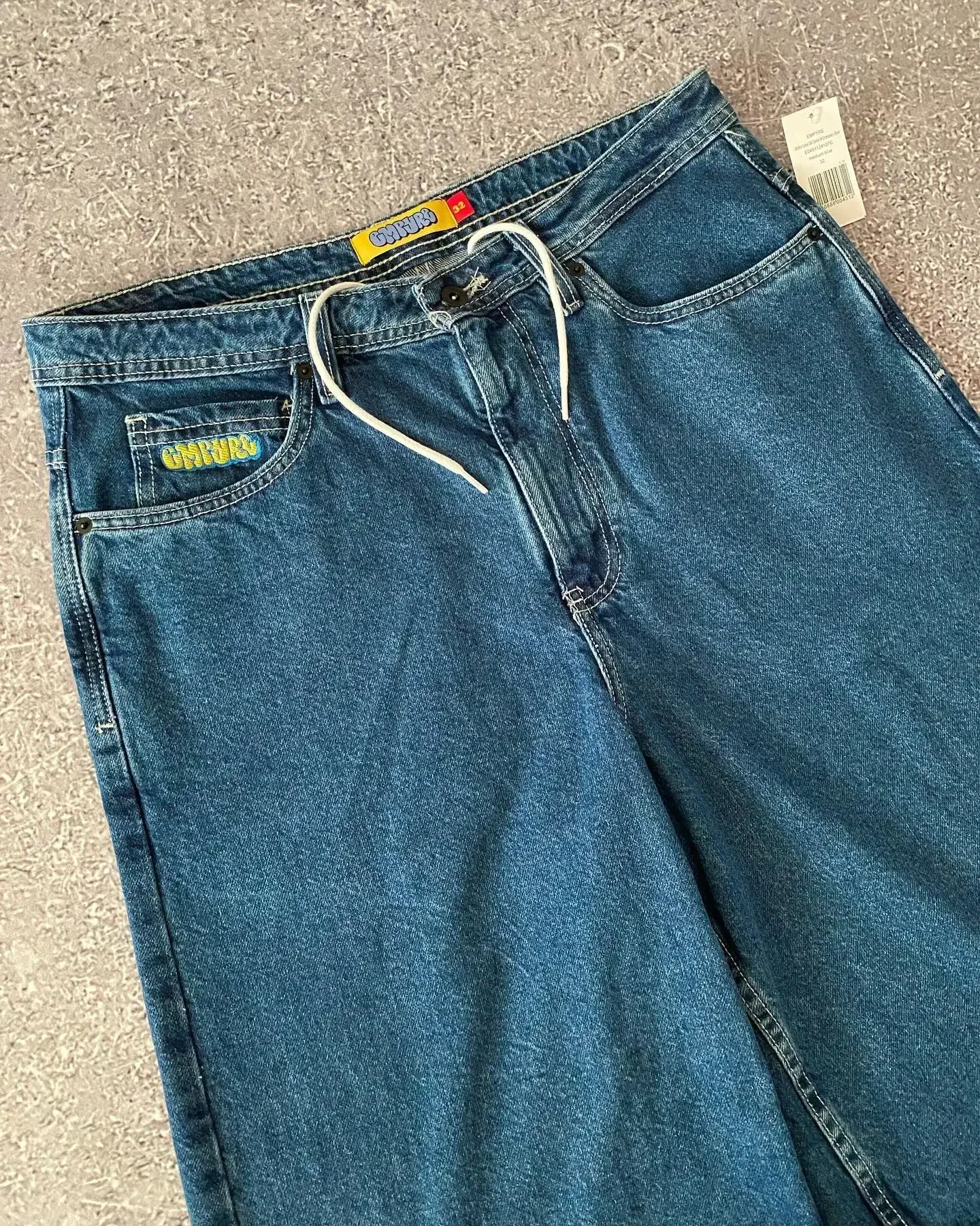 Y2k neue neuntägige Blue Jeans Skateboard Shorts Cartoon Stickerei lose Jeans Hose mit weitem Bein Paare tragen auf der Straße Hosen