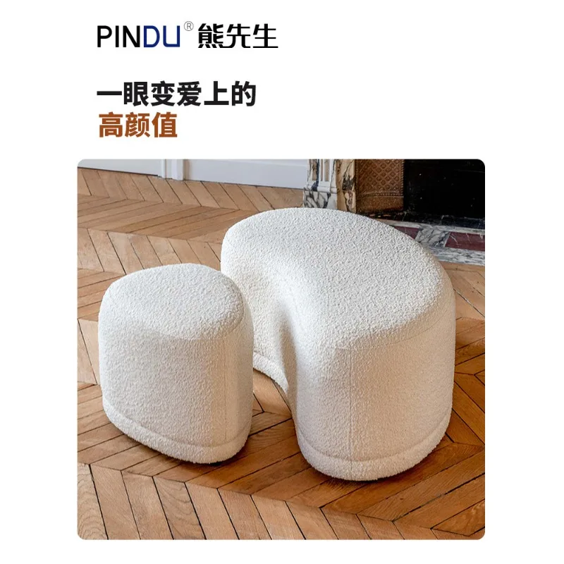 Crescent-shaped sofa stool, footrest, living room, bedroom, light luxury, and creative curved footrest, clothing and shoe store