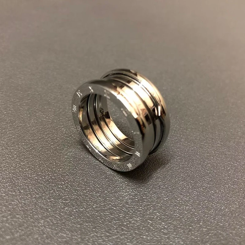 

Fashion Men Spring Finger Rings For Women Stainless Steel Classic Designer Kpop Fashion Casual Lover Jewelry Vintage Party Gift