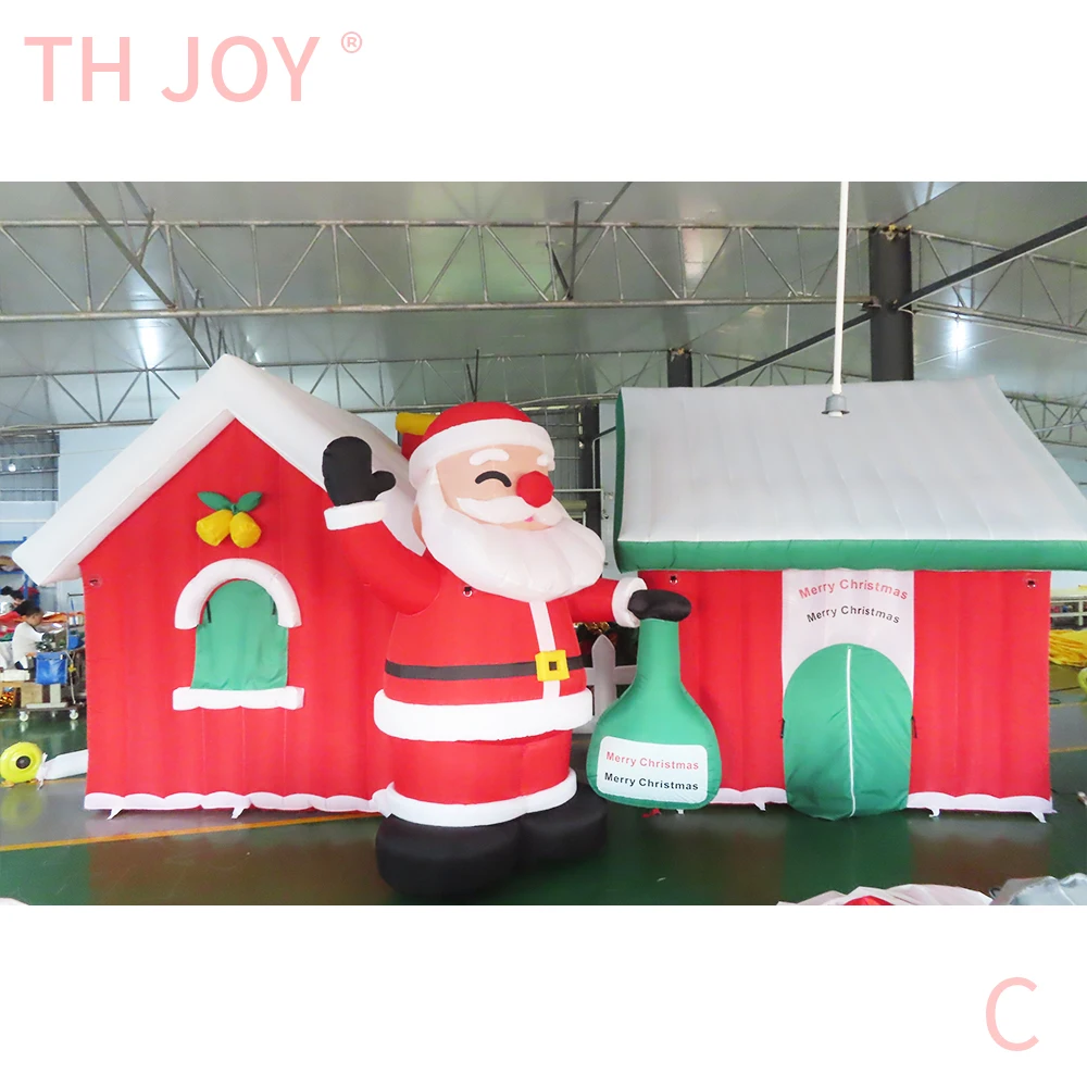 Envío aéreo rápido a puerta, Papá Noel inflable con casa de cabina, casa navideña inflable gigante con combos de anciano X mas