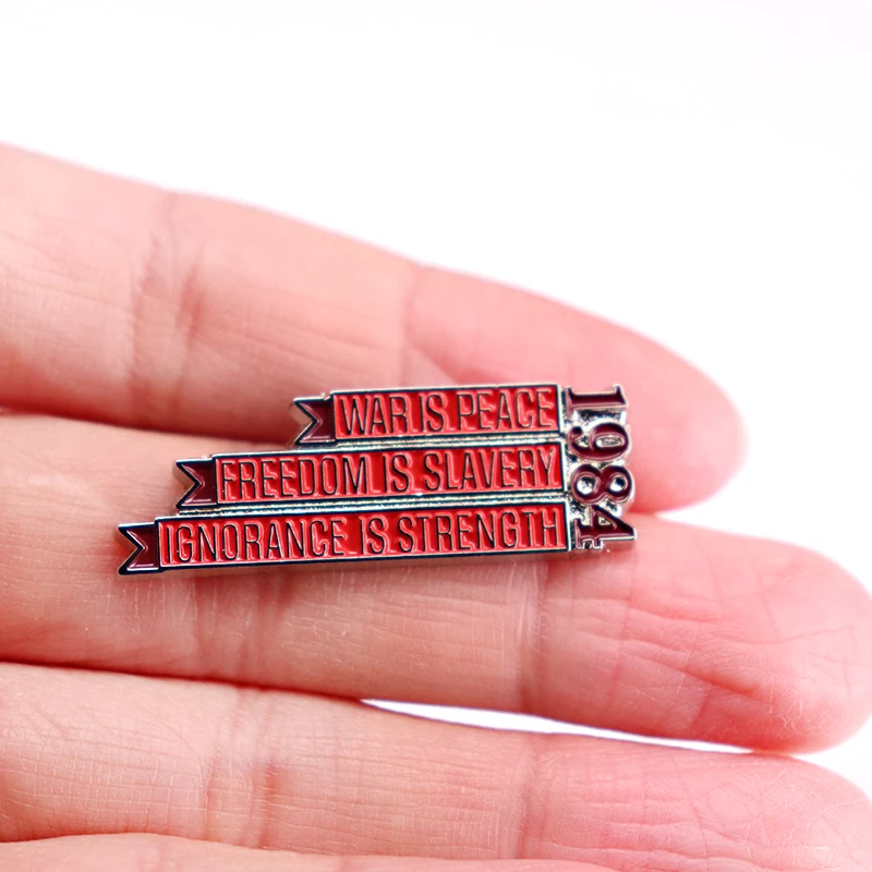 1984 War is Peace Freedom is Slavery Ignorance is Strength enamel pin metal badge