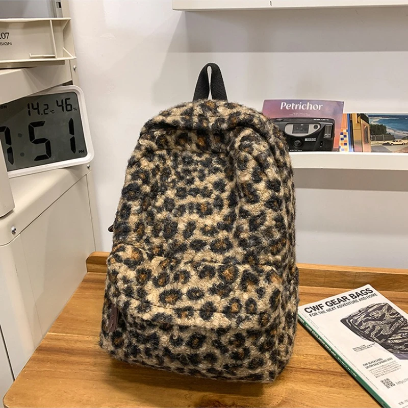 Y2K วินเทจตุ๊กตาเสือดาวพิมพ์กระเป๋าเป้สะพายหลังสำหรับสาวความจุขนาดใหญ่นักเรียนวิทยาลัยกระเป๋านักเรียนลำลองแบบพกพาสุภาพสตรีกระเป๋าสะพาย