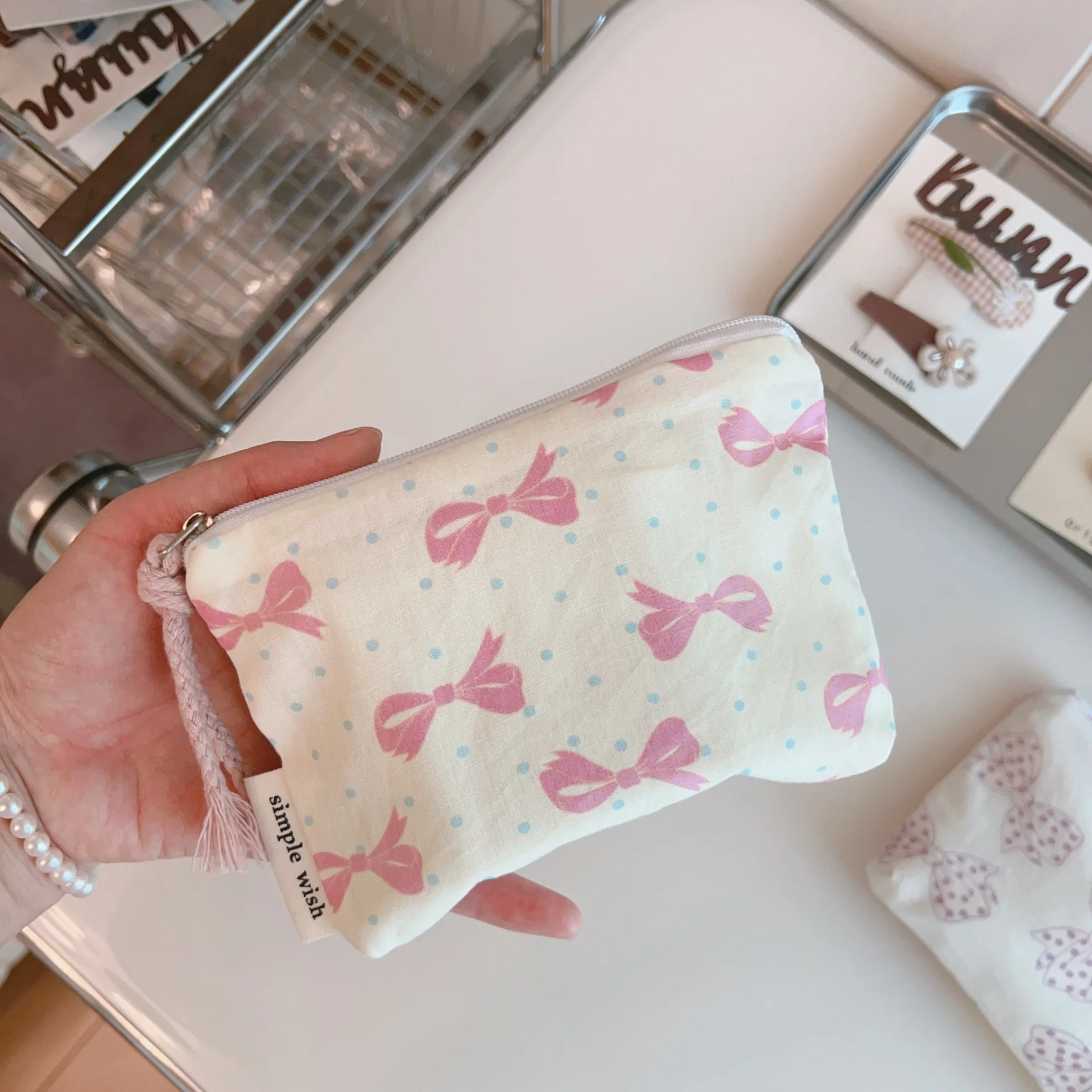 Elegante monedero con lazo, bolsa de maquillaje con lápiz labial floral, bolsa organizadora portátil de viaje, bolsa para tarjetas, auriculares, bolsa de almacenamiento para toallas sanitarias