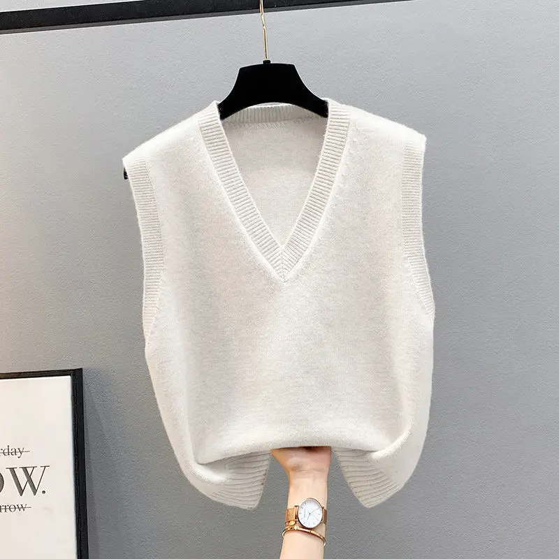 Wiosenne jesienne damskie swetry kamizelka wiosna jesień moda nowa bez rękawów z dekoltem w szpic Casual styl młodzieżowy solidna dzianina bluzki