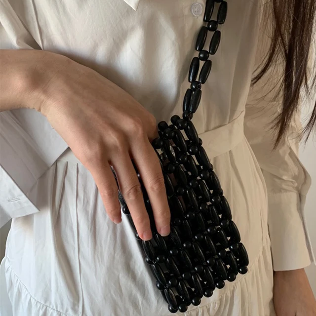 Vintage minimalistyczny drewniany koralik tkany torba na telefon komórkowy 2024 nowości Ins minimalistyczne letnie wakacje plażowe torby typu Crossbody dla kobiety
