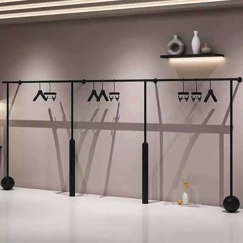 

Clothes display rack wrought iron black shelf women's clothing store display rack