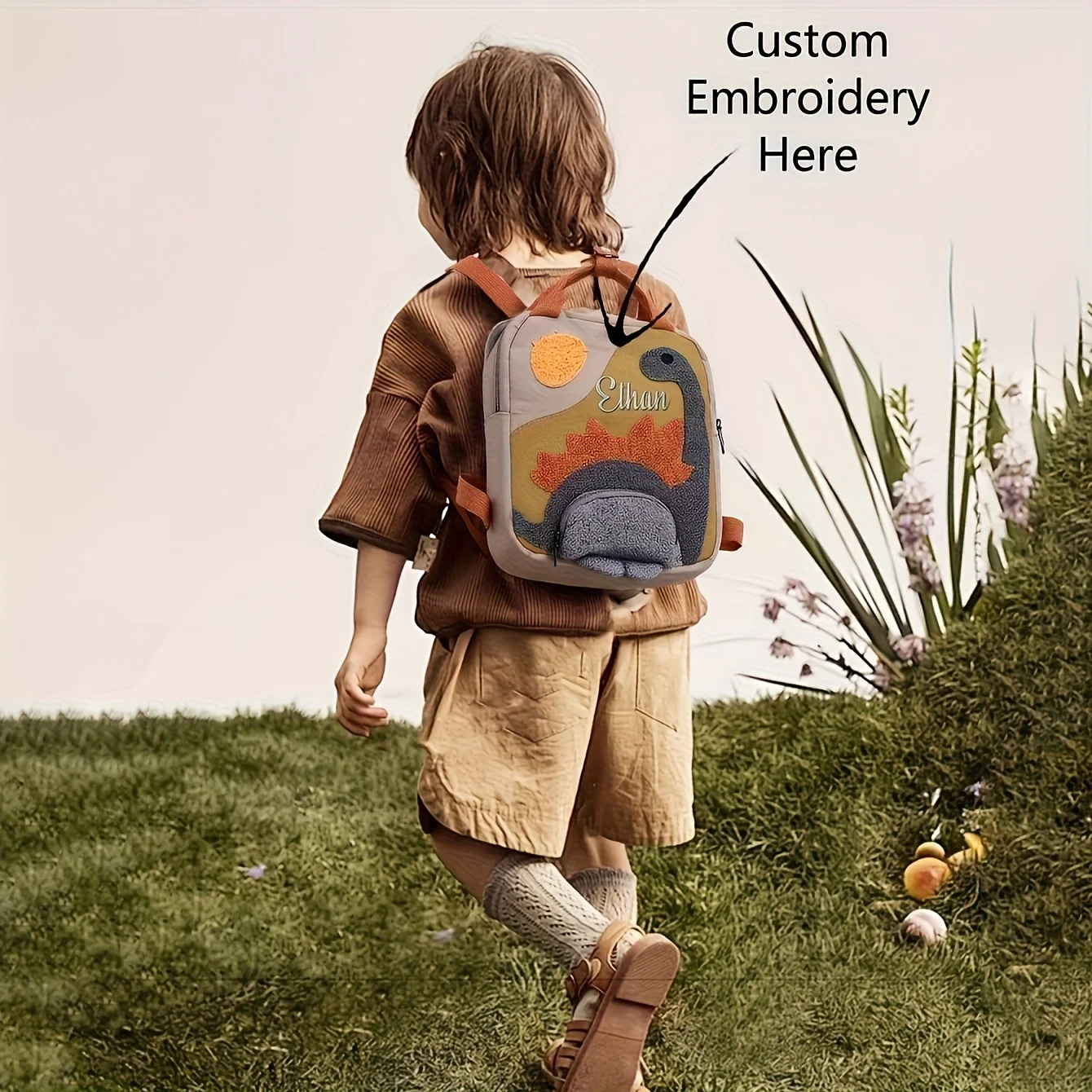 

Custom Name-Embroidered Dinosaur Kids' Backpack | Adjustable Straps | Outdoor/Kindergarten Gift