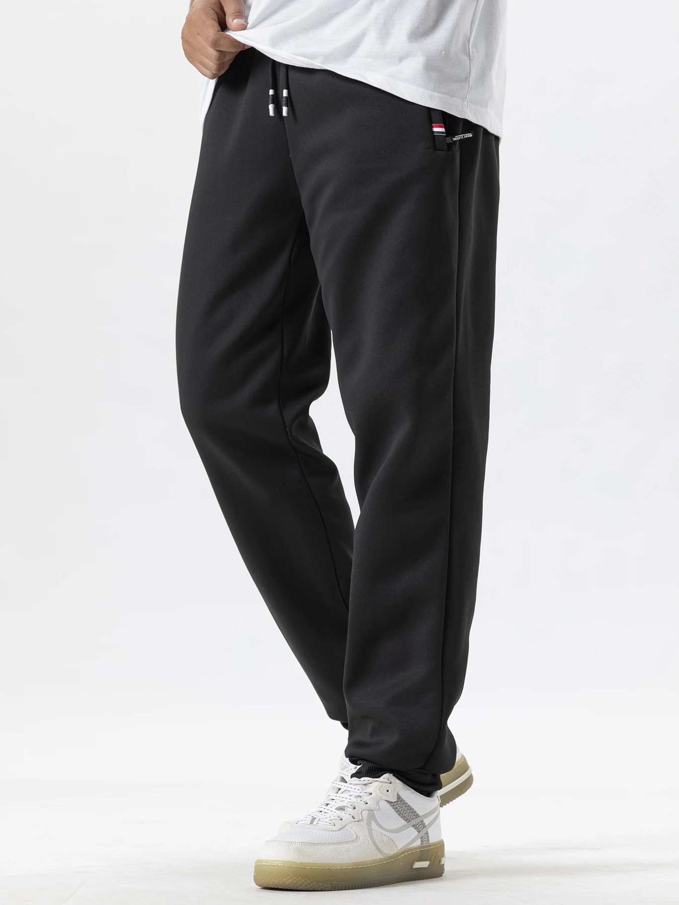 Pantaloni sportivi in pile addensato autunno inverno uomo donna pantaloni casual larghi con coulisse pantaloni sportivi all'aria aperta caldi pantaloni da jogging