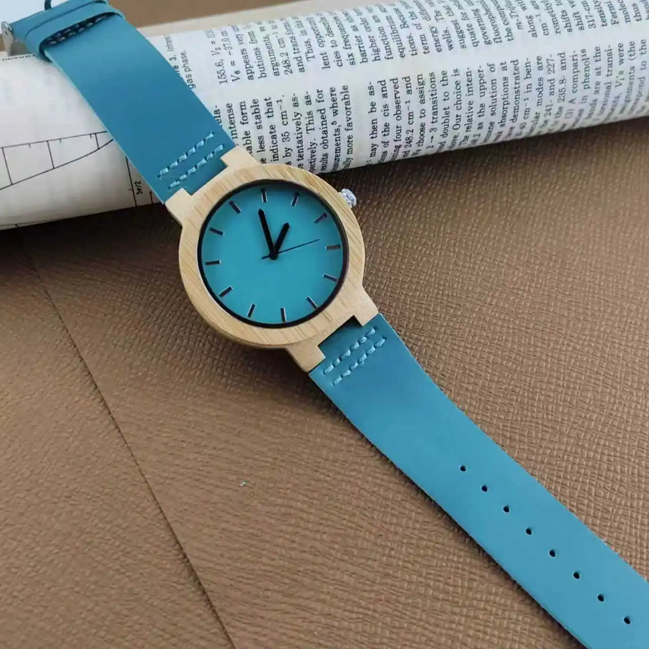 

Unique wooden watch, sky blue leather strap with stitched details, natural bamboo case and minimalist dial, Christmas holiday gi