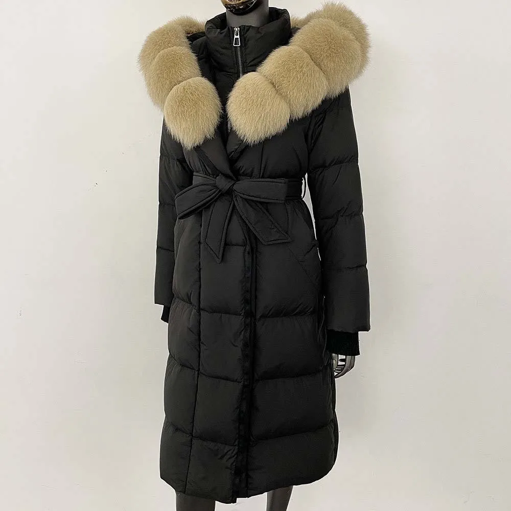 เสื้อแจ็คเก็ตพัฟเฟอร์แบบมีฮู้ดยาว ปี 2025 สำหรับผู้หญิง รุ่นใหม่ ฤดูหนาว อุ่นสบาย ขนห่านสีขาวแท้ พร้อมขนสุนัขจิ้งจอกแท้