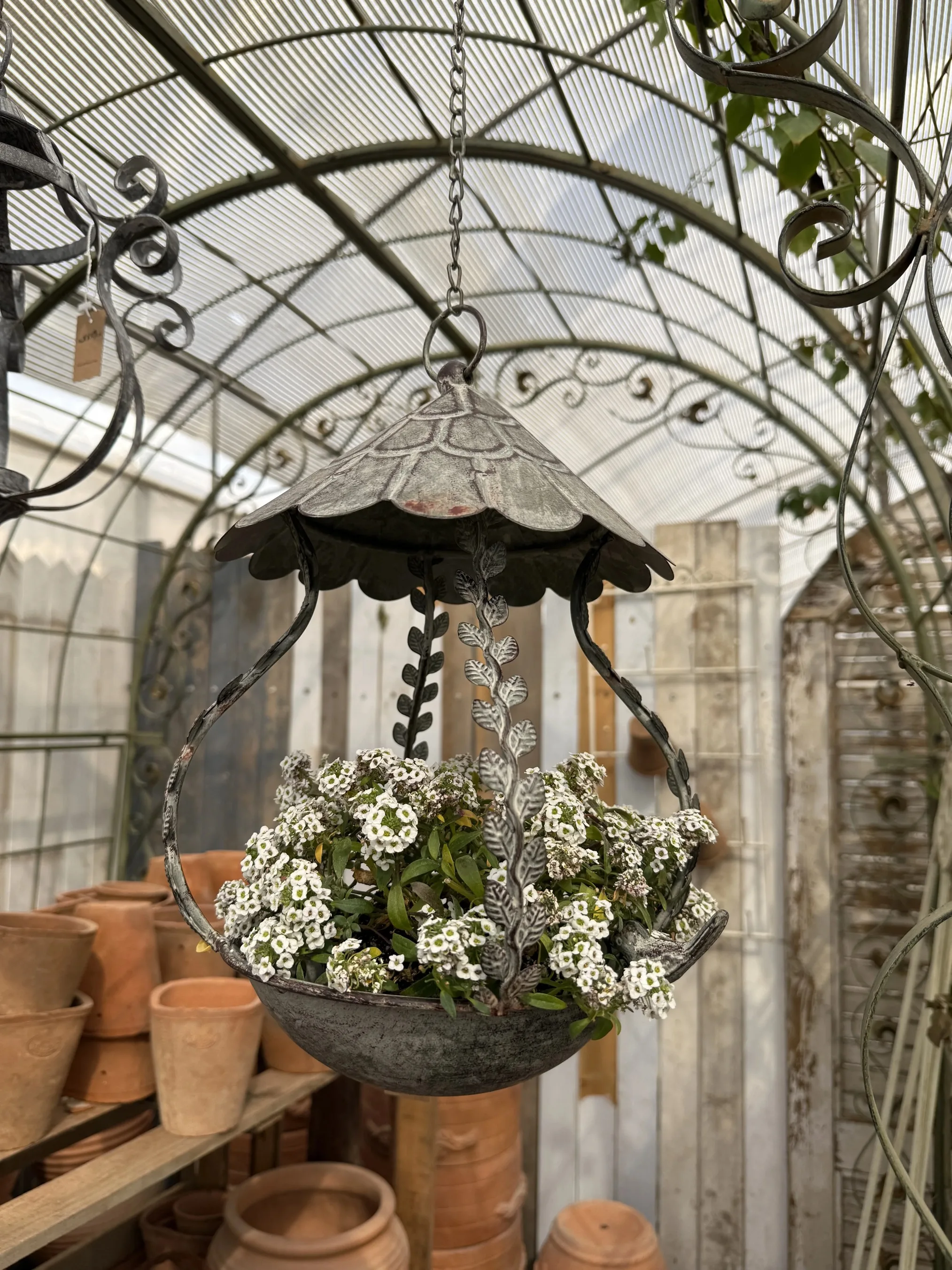 

Vintage Iron Hanging Basket Planter with Chain, Decorative Bird Design, Distressed Finish, 27 Inch Total Height, 11 Inch Diamete