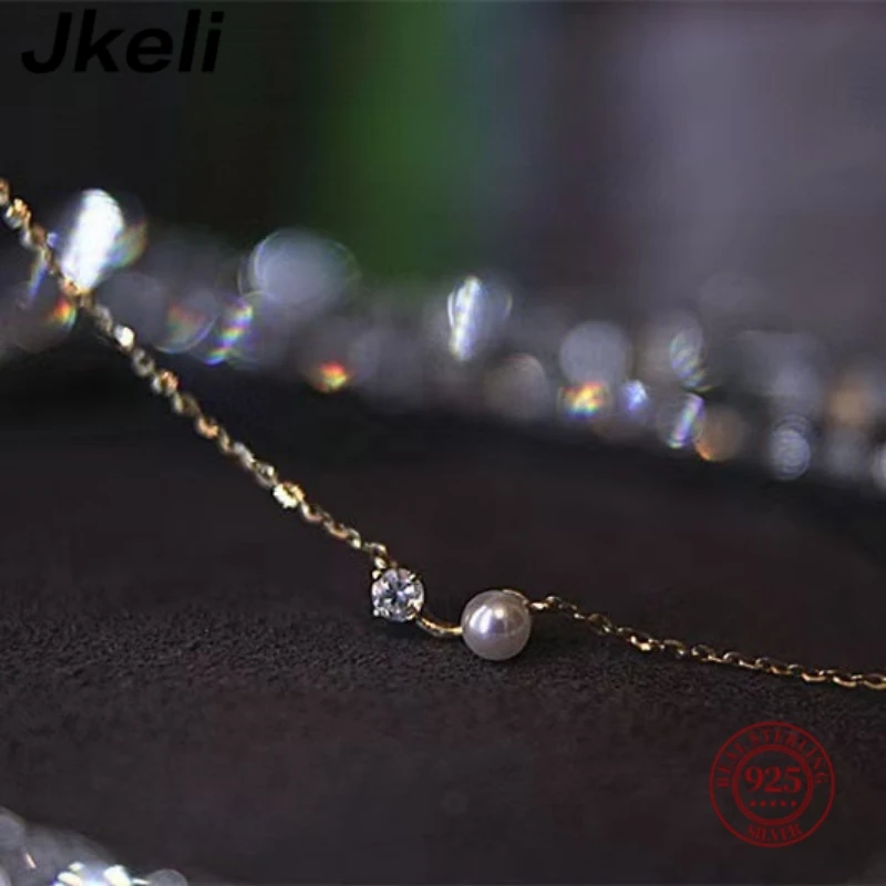 

Jkeli S925 Sterling Silver Pearl Necklace Elegantly Simple Lockbone Chain Versatile Minimalist Jewelry Accessory
