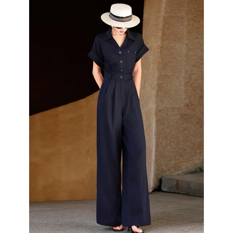 MEXCOCO 2026 New Summer Minimalist Office Lapel Collar Rolled Short Sleeve Belted High Waist Wide Leg Full Length Jumpsuit