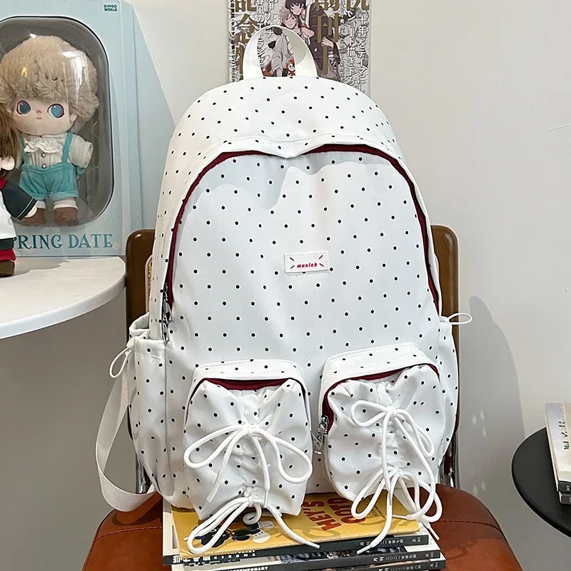 حقيبة ظهر الطالب مخططة من النايلون 2025 بساطة جديدة بلون سادة حقيبة ظهر عالية السعة للسفر خارج حقيبة ظهر متعددة الاستخدامات