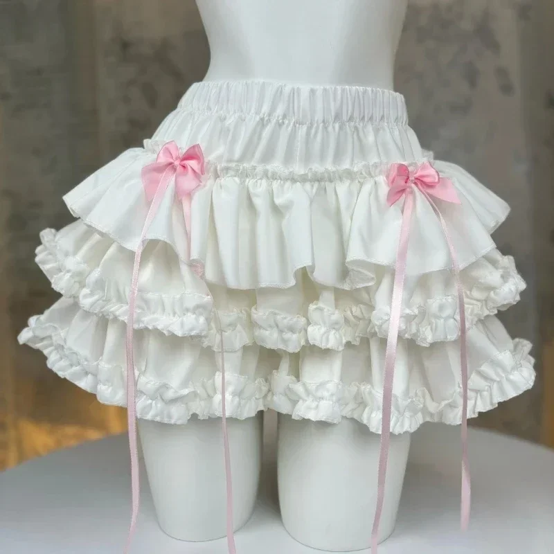 Mini jupe en dentelle à pois pour femmes, mode coréenne, avec nœud, Y2k, Harajuku, jupe trapèze, taille haute, élastique, pour filles, été 2024