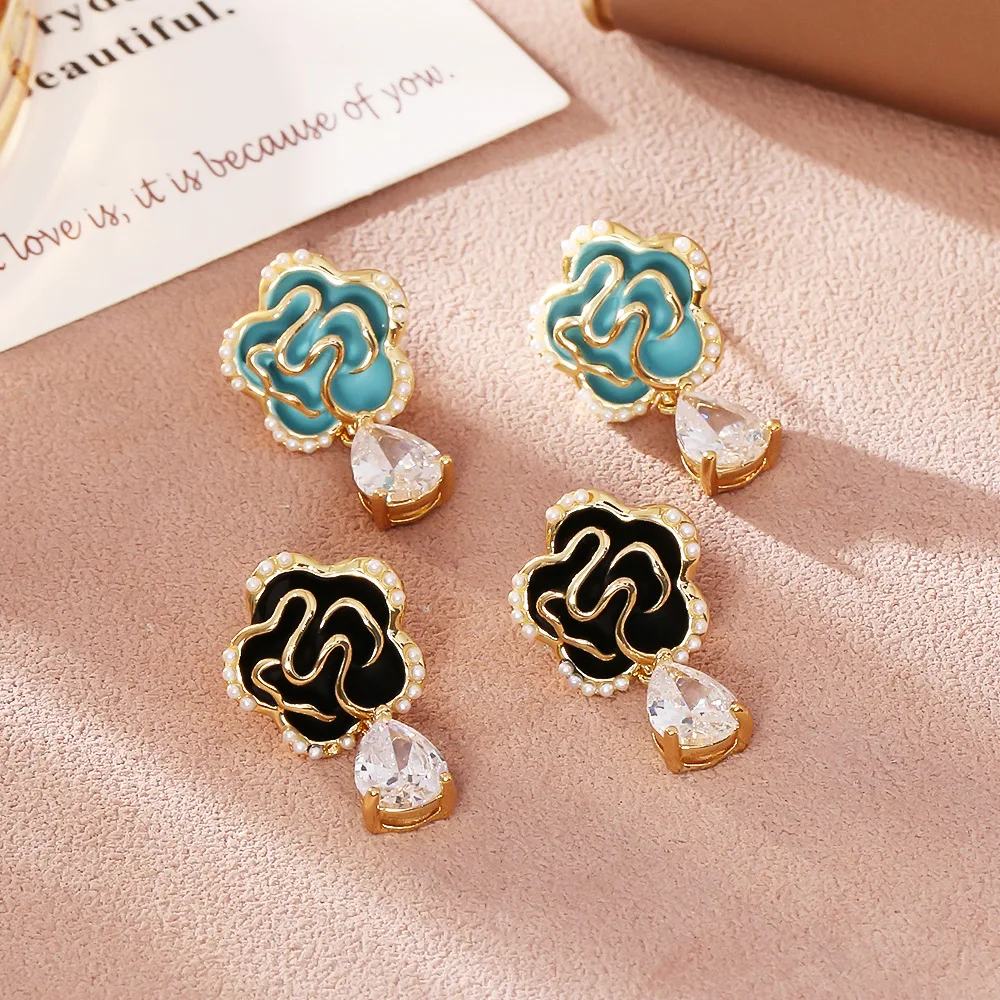 

Fashionable and exquisite retro camellia pearl earrings silver needle light luxury small fresh earrings women's earrings