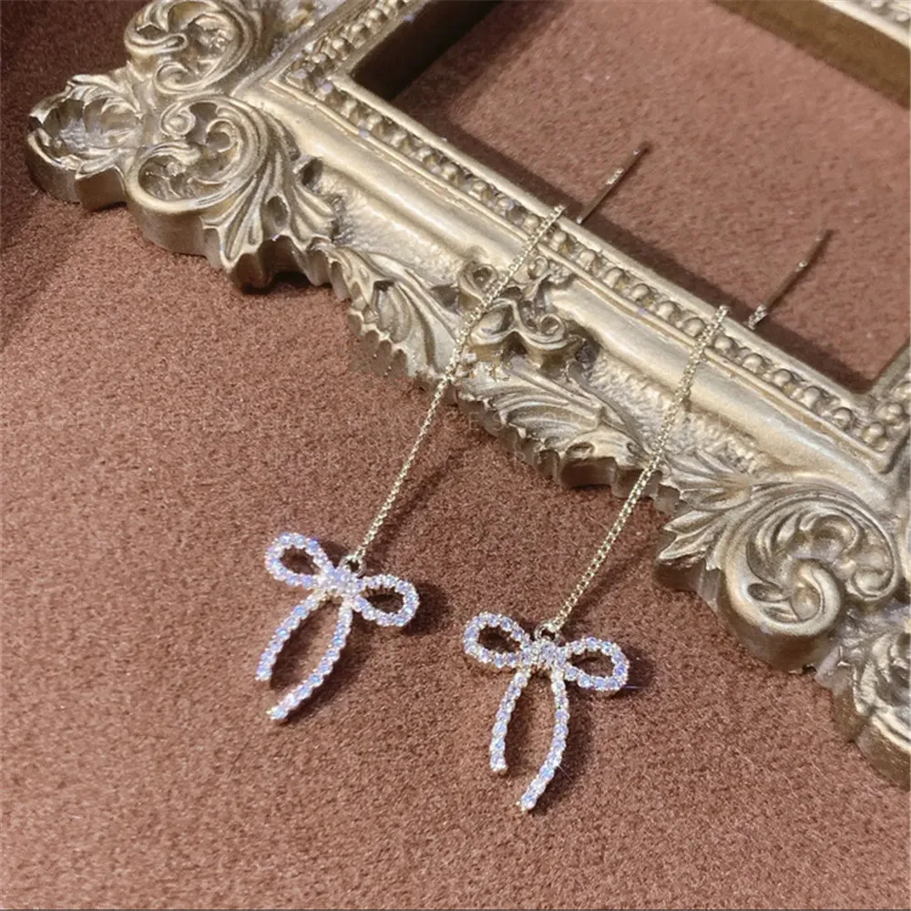 Boucles d'oreilles en argent S925 pour femmes, boucles d'oreilles à nœud micro-incrusté, tempérament de luxe léger, cadeau élégant et doux, mode