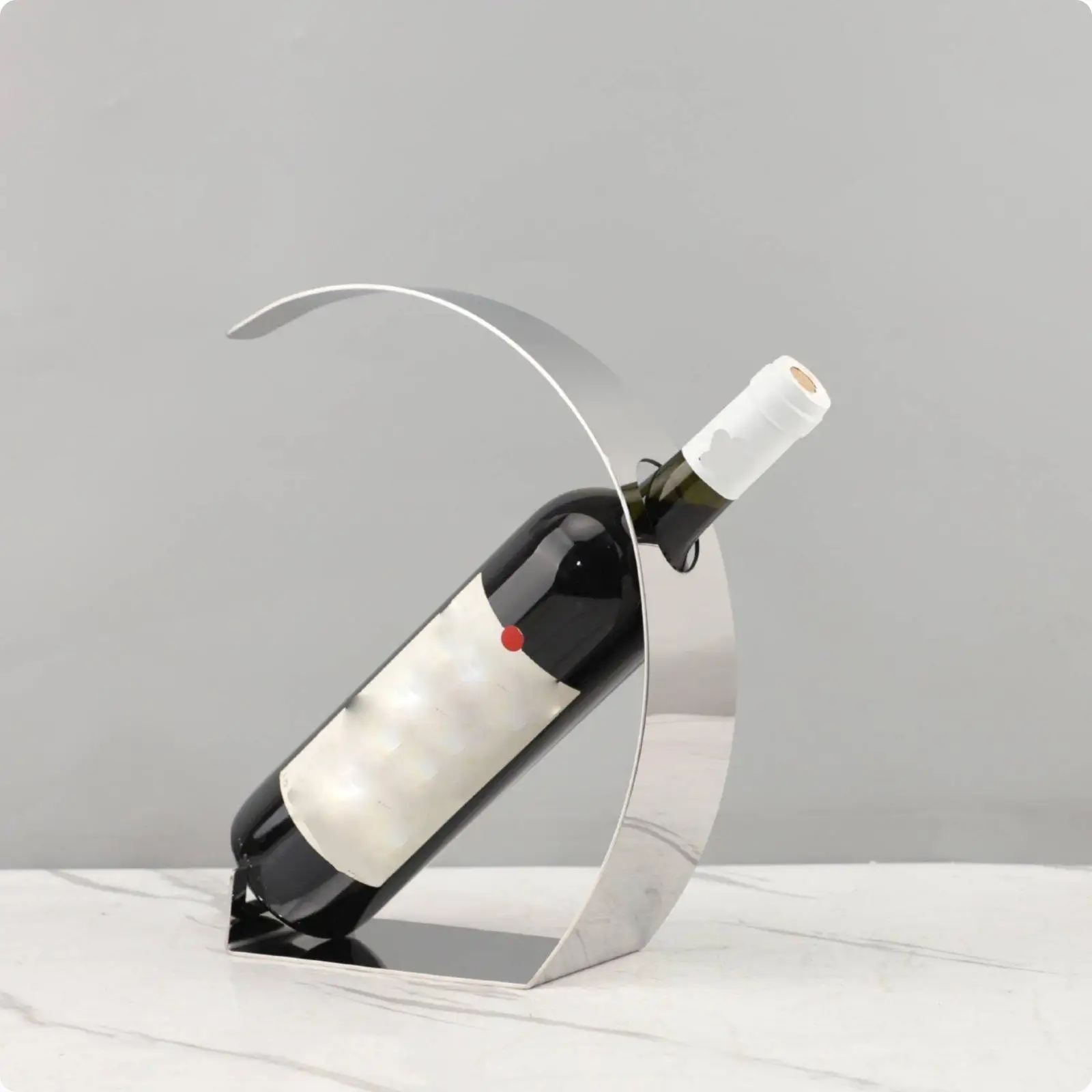 stainless-steel-bottle-holder-with-a-minimalist-elegant-and-curved-design