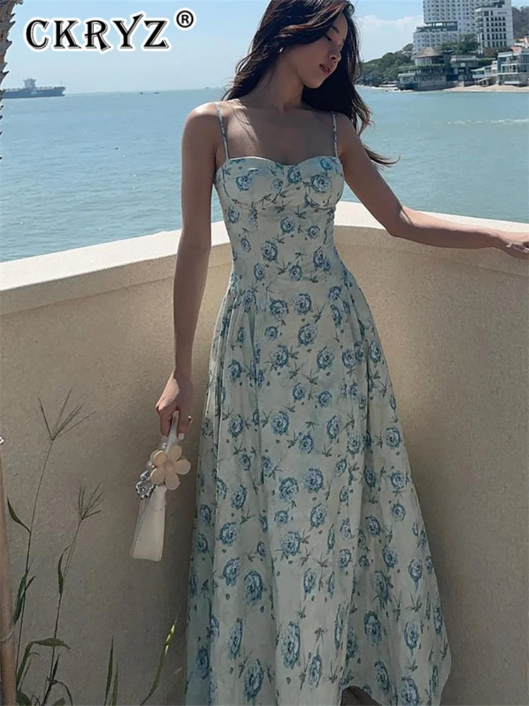 ชุดเดรสยาวลายดอกไม้สำหรับฤดูร้อน แฟชั่นใหม่สำหรับงานเลี้ยงกลางคืน ผู้หญิง แขนกุด เปิดหลัง เหมาะสำหรับวันหยุดพักผ่อน คลับ และสตรีทแวร์