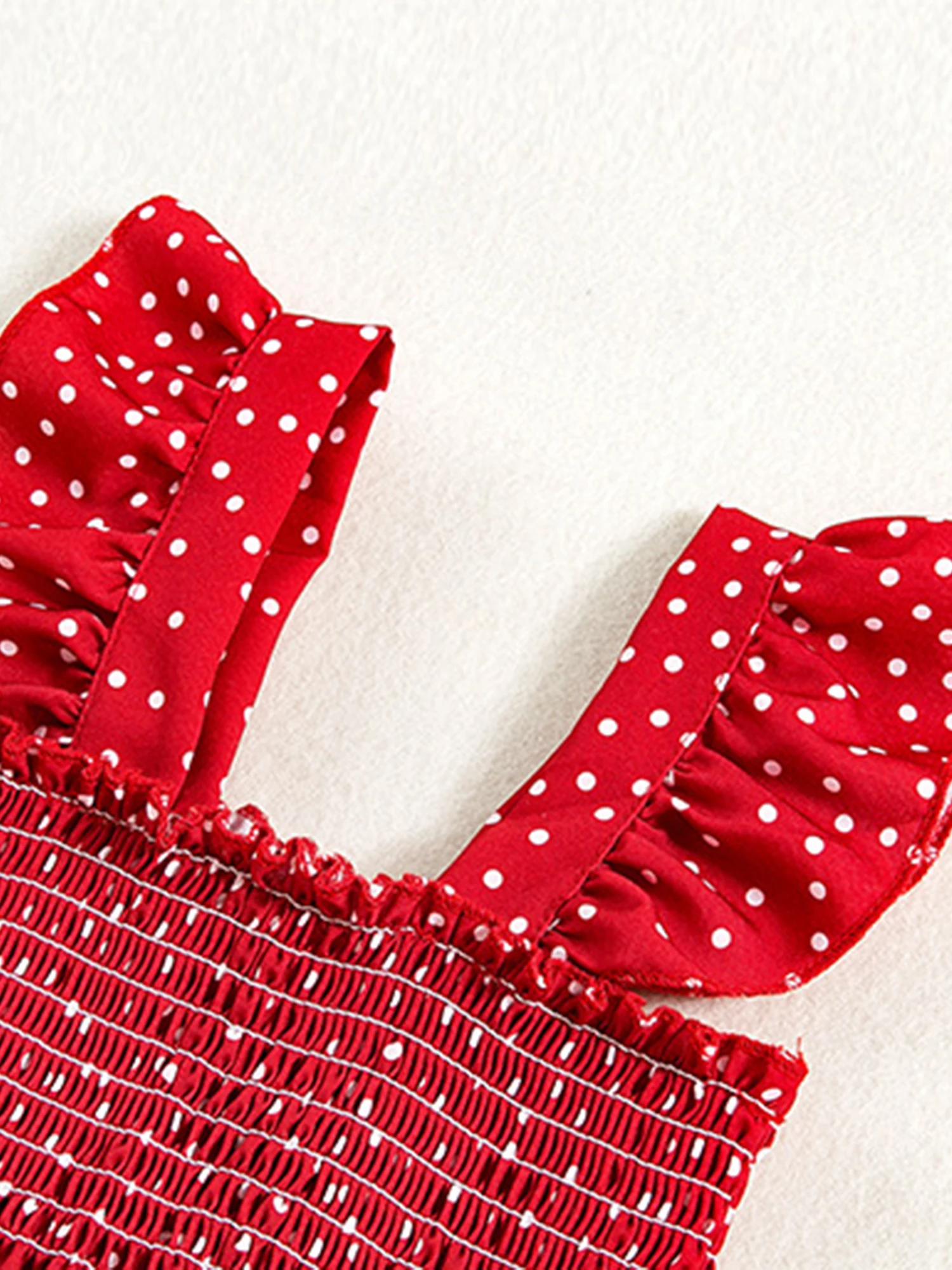 

Toddler Girl Ruffle Sleeve Romper Floral Print Jumpsuit Sweet Summer Outfit with Smocked Bodice and Bow Detail