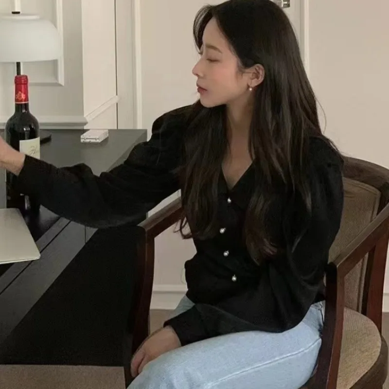 

Chic Spring Pearl Button ort Sve Doll Collar Ruffle Hem Women's Design Sense Minori irts Pure Color Commute Sle