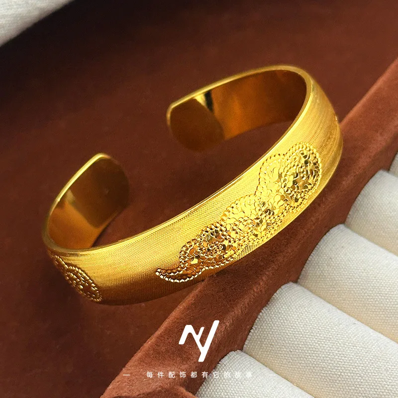 

Gold shop model 9999 24K real gold light luxury rich large bracelet brushed wide face crushed ice Xiangyun open female bracelet